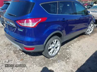 2015 Ford Escape Titanium with VIN 1FMCU0J93FUC20745, listed as a IAAI auction lot 41781551 with 174,538 mi miles and . Bid and sale history available at DreamBid. Image 4.