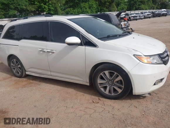 2015 Honda Odyssey Touring Elite with VIN 5FNRL5H96FB045968, listed as a IAAI auction lot 42263637 with 207,637 mi miles and . Bid and sale history available at DreamBid. Image 1.