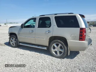 2014 Chevrolet Tahoe LTZ with VIN 1GNSKCE03ER201981, listed as a Copart auction lot 56421125 with 173,710 mi miles and Salvage title. Bid and sale history available at DreamBid. Image 2.