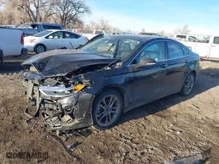 2020 Ford Fusion Hybrid Titanium with VIN 3FA6P0RU9LR141476, listed as a IAAI auction lot 41472921 with 84,433 mi miles. Bid and sale history available at carsss.com. Image 18.