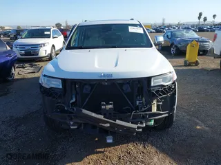 2014 Jeep Grand Cherokee Overland with VIN 1C4RJFCG8EC162271, listed as a IAAI auction lot 41827017 with 183,447 mi miles. Bid and sale history available at carsss.com. Image 13.