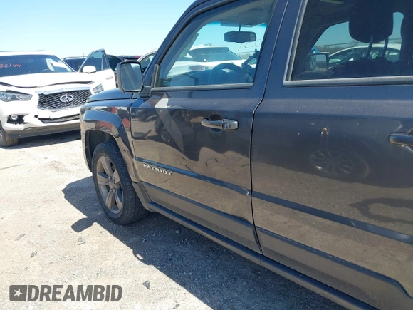 2014 Jeep Patriot Latitude with VIN 1C4NJPFA3ED928123, listed as a IAAI auction lot 41767231 with 136,318 mi miles and . Bid and sale history available at carsss.com. Image 6.