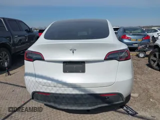 2022 Tesla Model Y Long Range with VIN 7SAYGDEE4NF428434, listed as a IAAI auction lot 41578503 with 35,460 mi miles and . Bid and sale history available at DreamBid. Image 16.