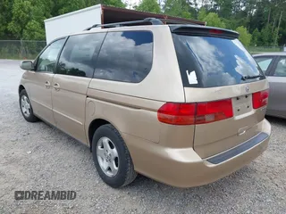 2001 Honda Odyssey EX z VIN 2HKRL18631H601677, wystawiony jako IAAI lot #42270829 z przebiegiem 205 706 mil mil oraz . Historia ofert i sprzedaży dostępna na DreamBid. Obrazek 3.