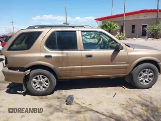2002 Isuzu Rodeo S z VIN 4S2CK58W024305673, wystawiony jako IAAI lot #42205119 z przebiegiem Nie podano mil oraz . Historia ofert i sprzedaży dostępna na DreamBid. Obrazek 12.