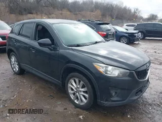 2014 Mazda CX-5 Grand Touring with VIN JM3KE4DY5E0373731, listed as a IAAI auction lot 41517852 with 148,414 mi miles. Bid and sale history available at carsss.com. Image 1.