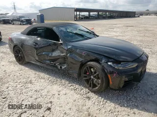2023 BMW 4 Series M440i with VIN WBA53AT06PCM44083, listed as a Copart auction lot 58314465 with Not provided miles and Salvage title. Bid and sale history available at DreamBid. Image 4.