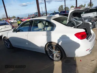 2016 BMW 3 Series 328i with VIN WBA8E9G58GNT47869, listed as a IAAI auction lot 41594120 with 57,561 mi miles. Bid and sale history available at carsss.com. Image 14.