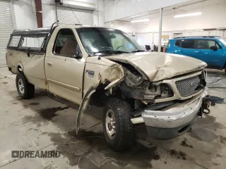 1999 Ford F-150 z VIN 1FTRF18W5XKB44503, wystawiony jako Copart lot #82359574 z przebiegiem 272 265 mil mil oraz Szkoda całkowita • Salvage title. Historia ofert i sprzedaży dostępna na DreamBid. Obrazek 4.