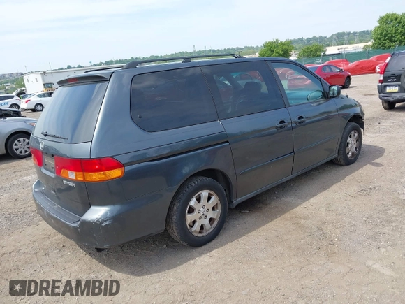 2004 Honda Odyssey EX-RES z VIN 5FNRL18824B138287, wystawiony jako IAAI lot #42245444 z przebiegiem 196 932 mil mil oraz . Historia ofert i sprzedaży dostępna na DreamBid. Obrazek 4.
