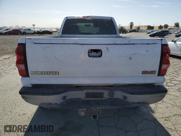 2002 GMC Sierra 2500HD SLE z VIN 1GTHC24G22E267031, wystawiony jako Copart lot #58606335 z przebiegiem Nie podano mil oraz Szkoda całkowita • Salvage title. Historia ofert i sprzedaży dostępna na DreamBid. Obrazek 6.