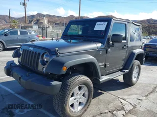2018 Jeep Wrangler Sport S with VIN 1C4GJWAGXJL904903, listed as a IAAI auction lot 41504471 with 70,693 mi miles and . Bid and sale history available at DreamBid. Image 2.