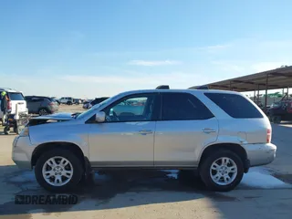 2004 Acura MDX Touring Pkg w/Navigation with VIN 2HNYD18804H546977, listed as a IAAI auction lot 41345964 with 161,856 mi miles. Bid and sale history available at carsss.com. Image 14.
