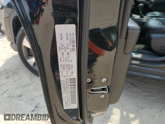 2019 Jeep Cherokee High Altitude with VIN 1C4PJMDX2KD283992, listed as a Copart auction lot 59849195 with 103,463 mi miles and Salvage title. Bid and sale history available at DreamBid. Image 13.