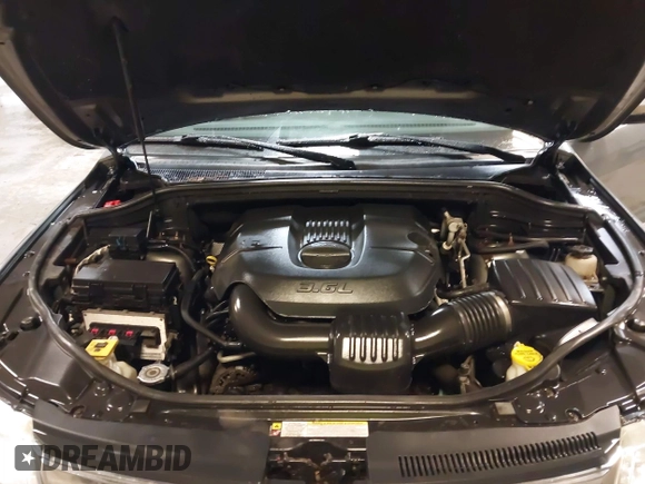 2011 Jeep Grand Cherokee Laredo with VIN 1J4RR4GG7BC578079, listed as a IAAI auction lot 42491750 with 197,581 mi miles and . Bid and sale history available at DreamBid. Image 10.