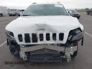2019 Jeep Cherokee Limited z VIN 1C4PJMDXXKD456514, wystawiony jako IAAI lot #42287253 z przebiegiem 58 451 mil mil oraz . Historia ofert i sprzedaży dostępna na DreamBid. Obrazek 6.