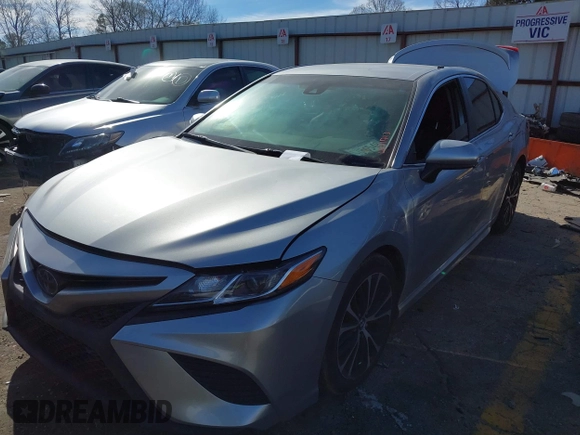 2019 Toyota Camry LE z VIN 4T1B11HK8KU681713, wystawiony jako IAAI lot #41823019 z przebiegiem 99 000 mil mil oraz . Historia ofert i sprzedaży dostępna na DreamBid. Obrazek 17.