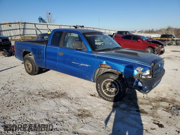 1999 Dodge Dakota SLT with VIN 1B7GL22X5XS321879, listed as a Copart auction lot 84015834 with 210,252 mi miles and Salvage Title. Bid and sale history available at carsss.com. Image 4.