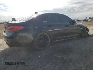 2019 BMW M5 z VIN WBSJF0C53KB447108, wystawiony jako Copart lot #51024275 z przebiegiem 58 387 mil mil oraz Szkoda całkowita • Salvage title. Historia ofert i sprzedaży dostępna na DreamBid. Obrazek 3.