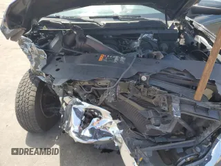 2018 Chevrolet Silverado 1500 LT with VIN 1GCRCREH5JZ261185, listed as a Copart auction lot 51847875 with 103,082 mi miles and Salvage Title. Bid and sale history available at DreamBid. Image 12.