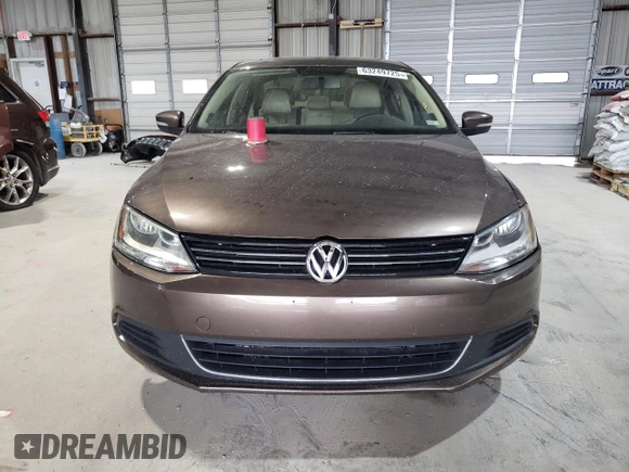 2014 Volkswagen Jetta TDI w/Premium/Nav with VIN 3VWLL7AJ3EM352687, listed as a Copart auction lot 63249725 with 122,678 mi miles and Clean title. Bid and sale history available at DreamBid. Image 5.