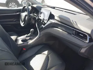 2023 Toyota Camry SE with VIN 4T1G11AK5PU163629, listed as a IAAI auction lot 42262131 with 47,617 mi miles and . Bid and sale history available at DreamBid. Image 5.