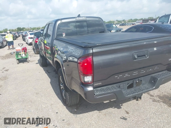 2018 Toyota Tacoma SR5 with VIN 3TMDZ5BN0JM051283, listed as a IAAI auction lot 42438690 with 106,155 mi miles and . Bid and sale history available at DreamBid. Image 3.