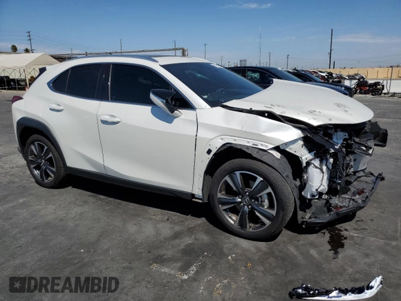 2024 Lexus UX with VIN JTHX6JBH7R2189588, listed as a Copart auction lot 70237664 with 9,963 mi miles and Salvage Title. Bid and sale history available at carsss.com. Image 4.