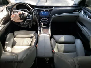 2013 Cadillac XTS Luxury with VIN 2G61R5S36D9141006, listed as a Copart auction lot 49471675 with 99,989 mi miles and Salvage Title. Bid and sale history available at carsss.com. Image 8.