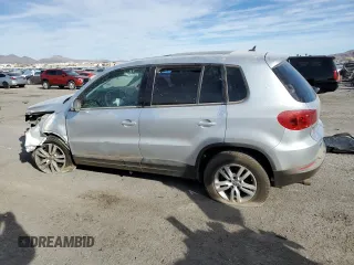2013 Volkswagen Tiguan S with VIN WVGAV3AX8DW559779, listed as a Copart auction lot 87512845 with 79,169 mi miles and Salvage title. Bid and sale history available at DreamBid. Image 2.