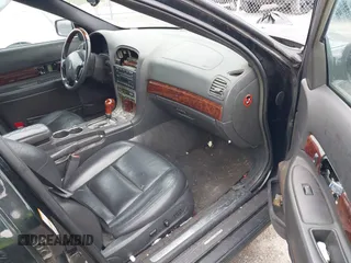 2002 Lincoln LS w/Base Pkg with VIN 1LNHM86S82Y701044, listed as a IAAI auction lot 41592614 with 192,902 mi miles. Bid and sale history available at carsss.com. Image 5.