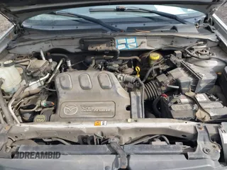 2001 Mazda Tribute LX with VIN 4F2YU08151KM06561, listed as a IAAI auction lot 41478779 with 54,826 mi miles and . Bid and sale history available at DreamBid. Image 10.