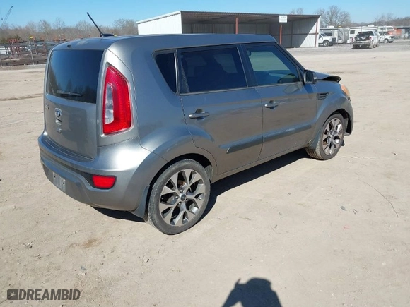 2013 Kia Soul + with VIN KNDJT2A65D7576335, listed as a IAAI auction lot 41629622 with 183,319 mi miles. Bid and sale history available at carsss.com. Image 4.