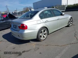 2006 BMW 3 Series 330xi with VIN WBAVD33566KV63437, listed as a IAAI auction lot 41378595 with 169,691 mi miles. Bid and sale history available at carsss.com. Image 4.