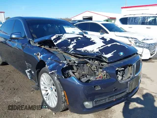 2012 BMW 7 Series 750Li xDrive with VIN WBAKC8C52CC436399, listed as a IAAI auction lot 41214440 with 122,532 mi miles and . Bid and sale history available at DreamBid. Image 6.