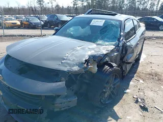 2019 Dodge Charger SXT with VIN 2C3CDXJG1KH537825, listed as a IAAI auction lot 41482387 with 71,062 mi miles and . Bid and sale history available at DreamBid. Image 6.
