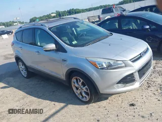 2013 Ford Escape Titanium with VIN 1FMCU0J94DUB58785, listed as a IAAI auction lot 42631897 with 163,037 mi miles and . Bid and sale history available at DreamBid. Image 1.