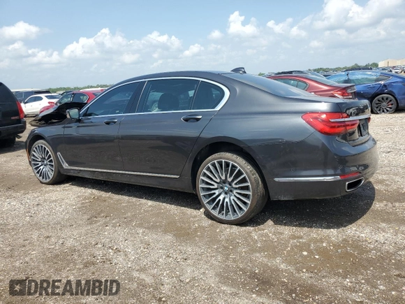 2016 BMW 7 Series 740i z VIN WBA7E2C57GG714564, wystawiony jako Copart lot #56186285 z przebiegiem 111 598 mil mil oraz Szkoda całkowita • Salvage title. Historia ofert i sprzedaży dostępna na DreamBid. Obrazek 2.