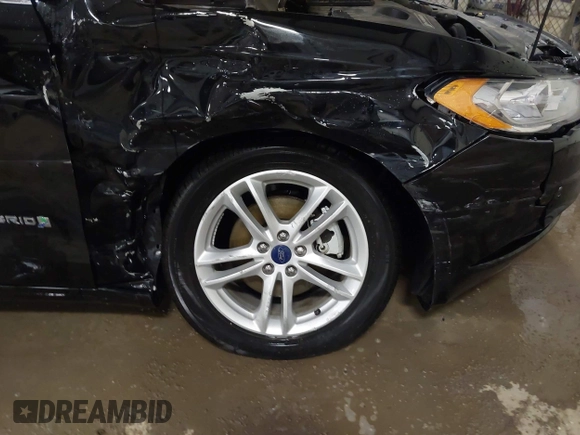 2018 Ford Fusion SE z VIN 3FA6P0LU3JR203864, wystawiony jako IAAI lot #41476335 z przebiegiem 49 246 mil mil oraz . Historia ofert i sprzedaży dostępna na DreamBid. Obrazek 6.