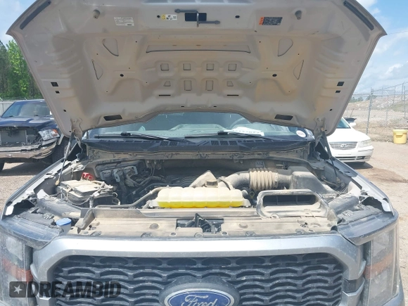 2023 Ford F-150 XL with VIN 1FTFW1E55PKE96110, listed as a IAAI auction lot 42127827 with 35,741 mi miles and . Bid and sale history available at DreamBid. Image 10.