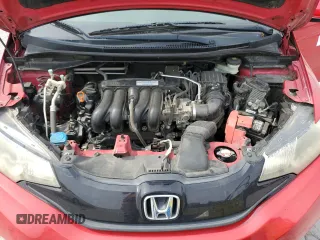 2016 Honda Fit LX z VIN JHMGK5H56GX010389, wystawiony jako Copart lot #60806645 z przebiegiem 162 670 mil mil oraz Czysty tytuł • Clean title. Historia ofert i sprzedaży dostępna na DreamBid. Obrazek 11.