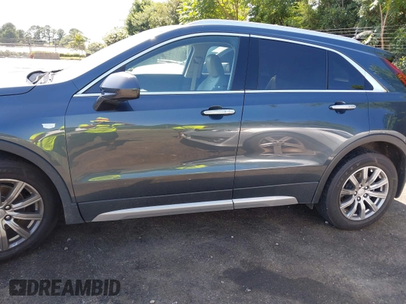 2019 Cadillac XT4 AWD Premium Luxury with VIN 1GYFZDR40KF129461, listed as a IAAI auction lot 42531671 with 60,731 mi miles and . Bid and sale history available at DreamBid. Image 14.
