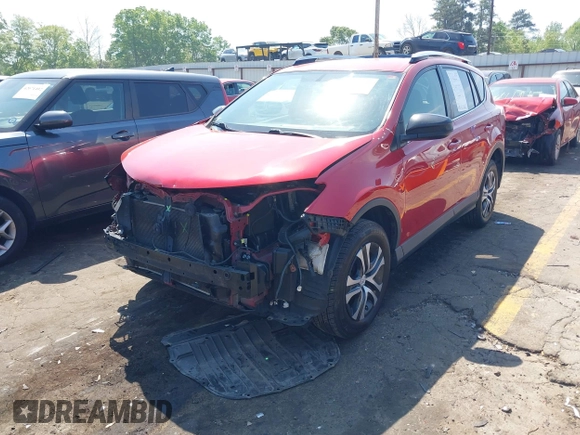 2016 Toyota RAV4 LE with VIN JTMZFREV1GJ098247, listed as a IAAI auction lot 42065800 with 199,172 mi miles and . Bid and sale history available at DreamBid. Image 19.