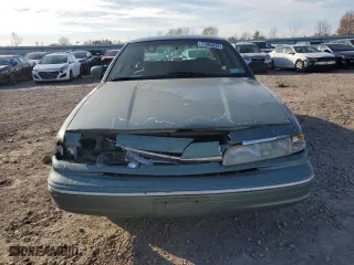 1997 Ford Crown Victoria with VIN 2FALP73W6VX173232, listed as a Copart auction lot 77805094 with 228,871 mi miles and Salvage Title. Bid and sale history available at carsss.com. Image 5.