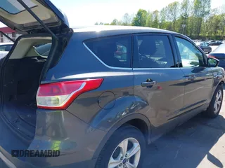2015 Ford Escape SE with VIN 1FMCU9G98FUB04601, listed as a IAAI auction lot 42020737 with 176,487 mi miles and . Bid and sale history available at DreamBid. Image 4.