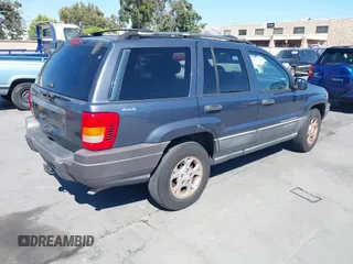 2001 Jeep Grand Cherokee Laredo with VIN 1J4GW48S31C550460, listed as a IAAI auction lot 42769410 with 261,640 mi miles and . Bid and sale history available at DreamBid. Image 4.