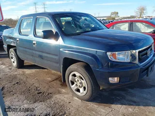 2010 Honda Ridgeline RT with VIN 5FPYK1F24AB009225, listed as a IAAI auction lot 40822938 with 273,986 mi miles. Bid and sale history available at carsss.com. Image 1.