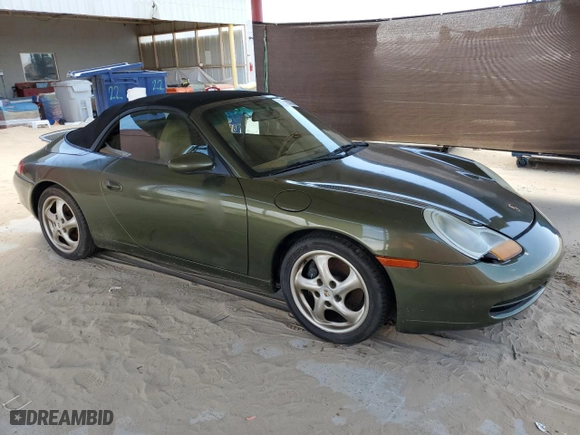 1999 Porsche 911 Carrera with VIN WP0CA2990XS650386, listed as a Copart auction lot 66893064 with 134,519 mi miles and Salvage Title. Bid and sale history available at carsss.com. Image 4.