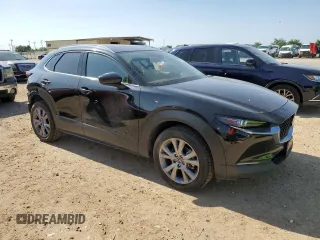 2020 Mazda CX-30 Premium with VIN 3MVDMBEM9LM112566, listed as a Copart auction lot 55473345 with 80,519 mi miles and Salvage title. Bid and sale history available at DreamBid. Image 4.