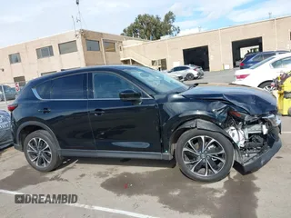 2023 Mazda CX-5 2.5 S Premium Package with VIN JM3KFBDM4P0266378, listed as a IAAI auction lot 41655712 with 31,746 mi miles. Bid and sale history available at carsss.com. Image 13.